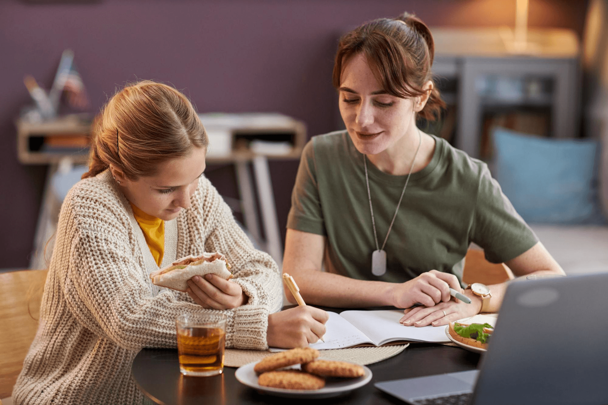 Parent helping a student with school work